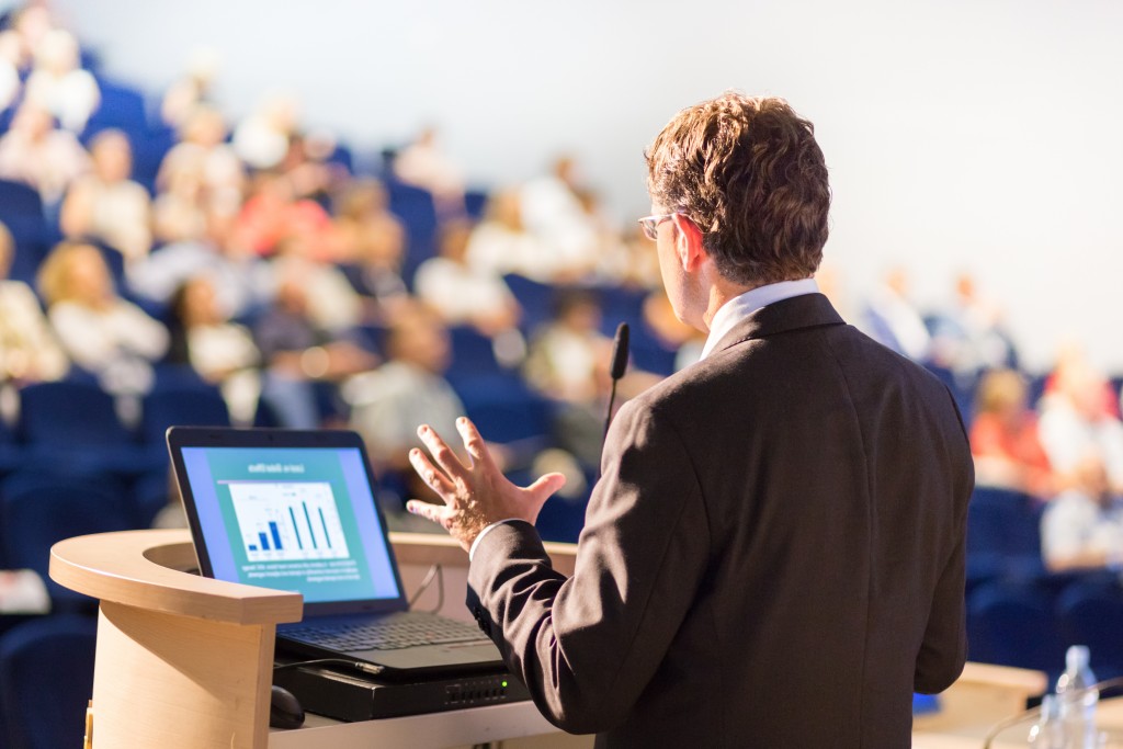 Speaker at Business Conference with Public Presentations