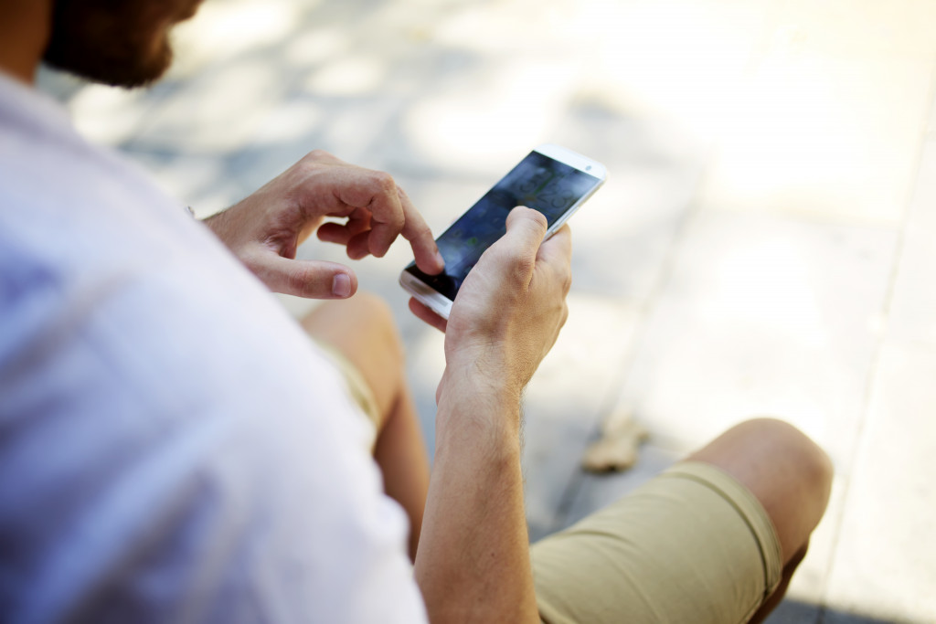 man using his phone