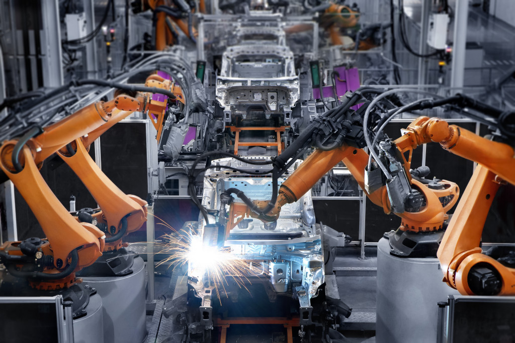 Welding robots in a car manufacturing plant.