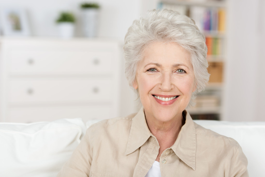 senior woman at home smiling and happy