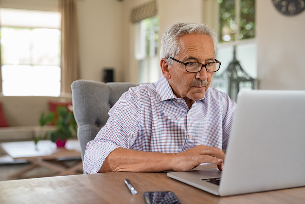 senior man using a laptop 