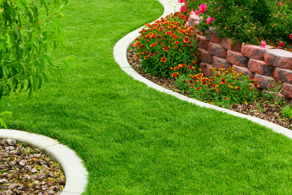 natural landscaping with paved plant areas and flowers