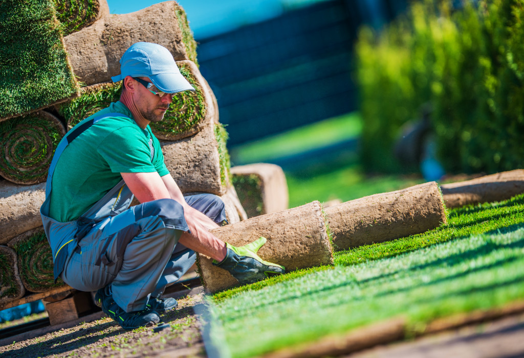 natural landscaping being handled by a sod installer