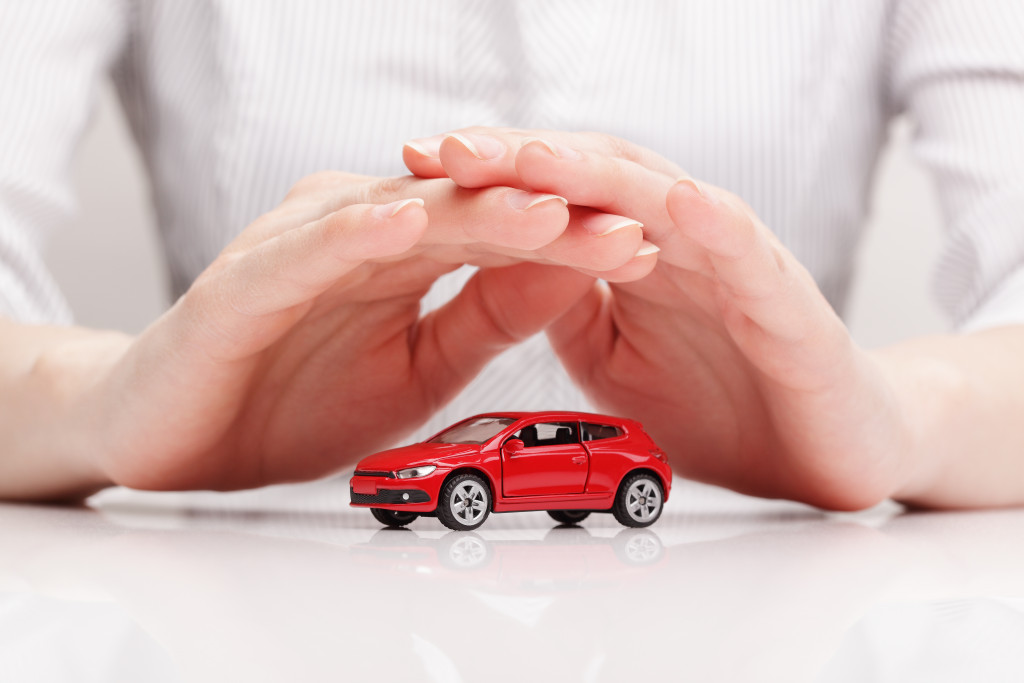 small red car on a table